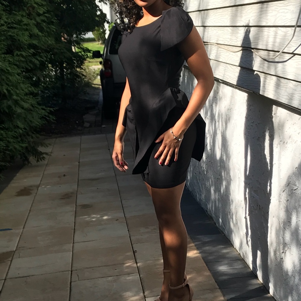 Black fitted peplum dress